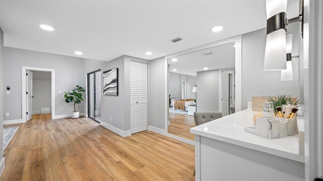 bathroom featuring wood-type flooring