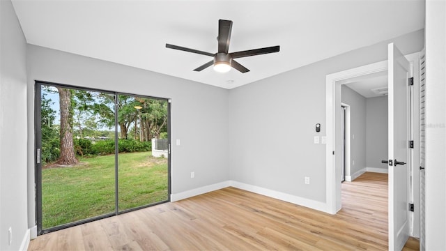 unfurnished room featuring ceiling fan and light hardwood / wood-style floors