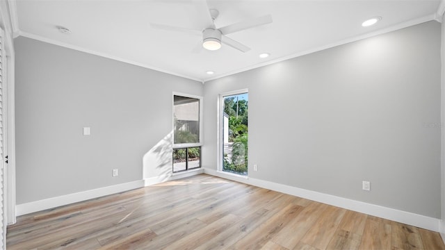 unfurnished room with crown molding, light hardwood / wood-style floors, and ceiling fan