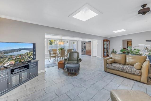 living room featuring a skylight