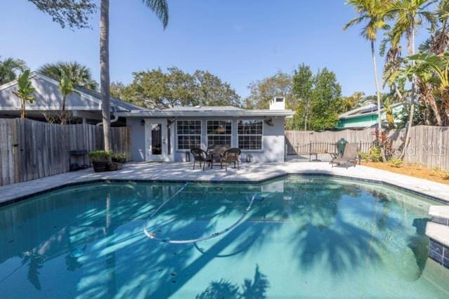 view of swimming pool featuring a patio