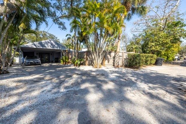 exterior space with a carport