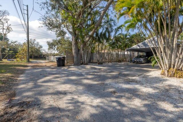 exterior space featuring a carport