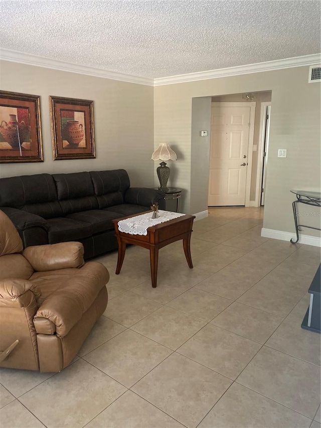 living room with ornamental molding, light tile patterned floors, and a textured ceiling