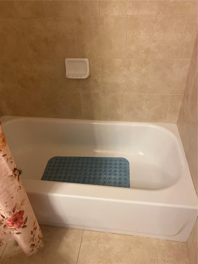 bathroom with tile patterned flooring