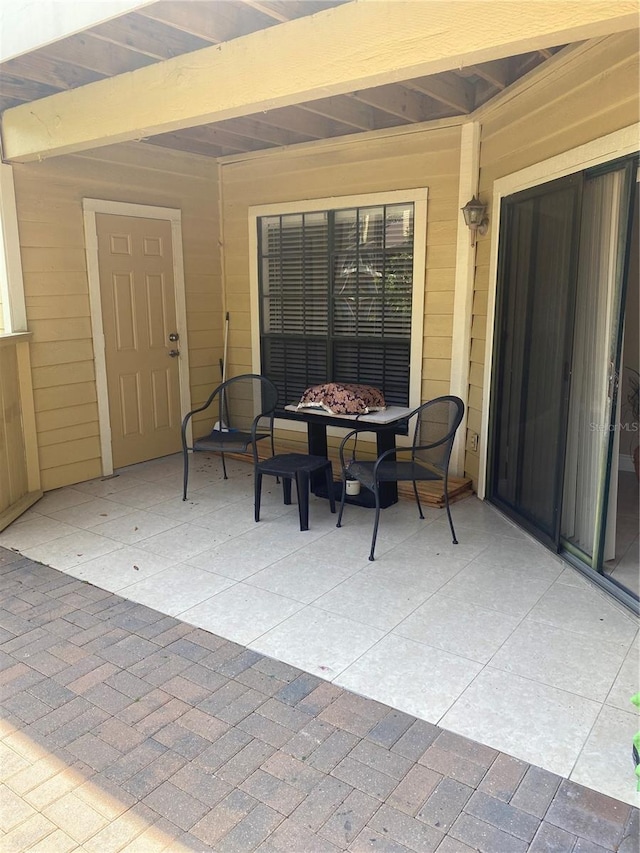 view of patio / terrace with an outdoor fire pit