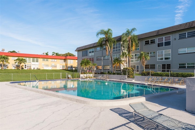 view of swimming pool with a patio area