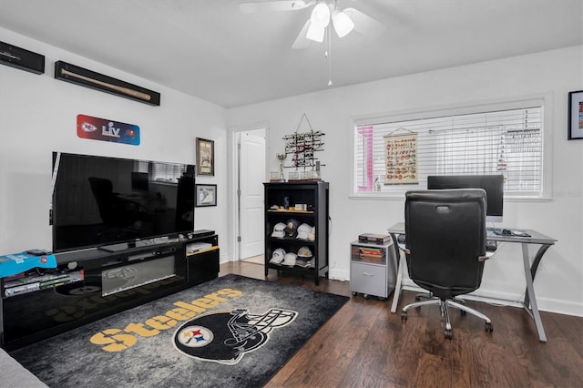 office area featuring ceiling fan, plenty of natural light, and dark hardwood / wood-style flooring