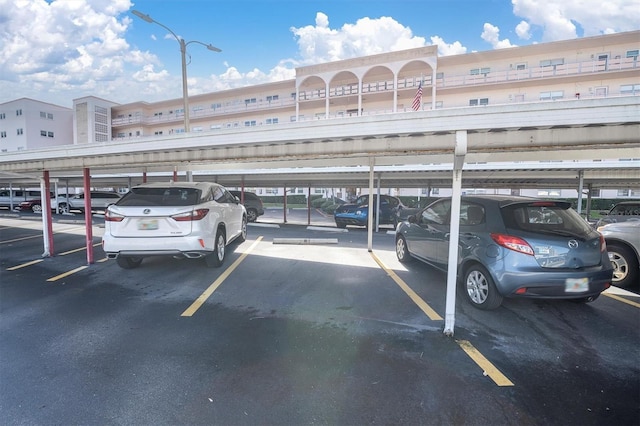 view of parking with a carport