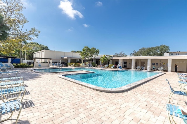 view of swimming pool featuring a patio
