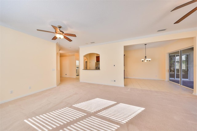 unfurnished living room with light colored carpet, ornamental molding, and ceiling fan with notable chandelier