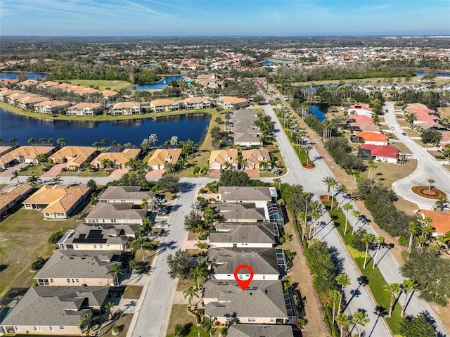 drone / aerial view with a water view