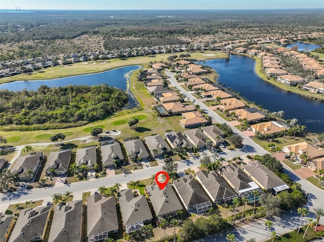 drone / aerial view featuring a water view