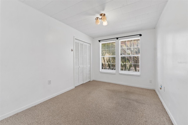 empty room featuring carpet