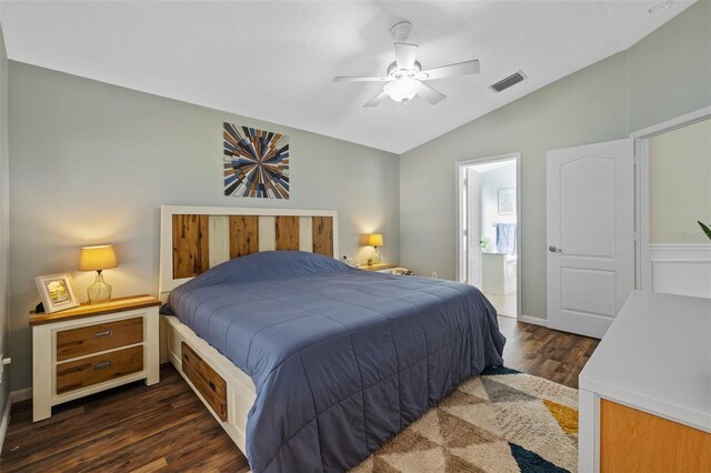 bedroom with ceiling fan, lofted ceiling, dark hardwood / wood-style flooring, and ensuite bathroom