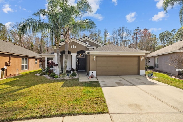 view of front of house featuring a garage and a front yard