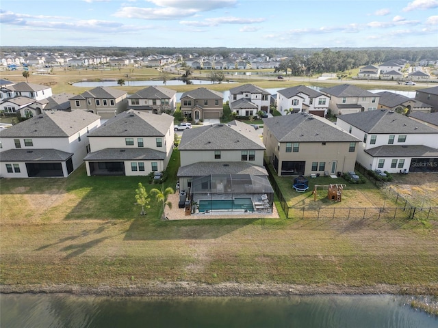 drone / aerial view featuring a water view