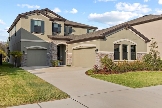 view of front of home featuring a garage and a front lawn