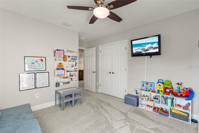 playroom with light colored carpet