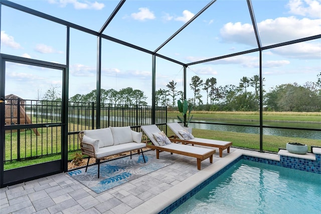 exterior space featuring a water view, a lanai, and a patio