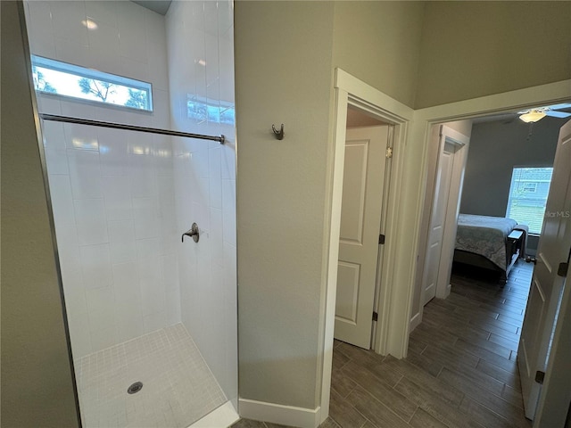 bathroom with a tile shower