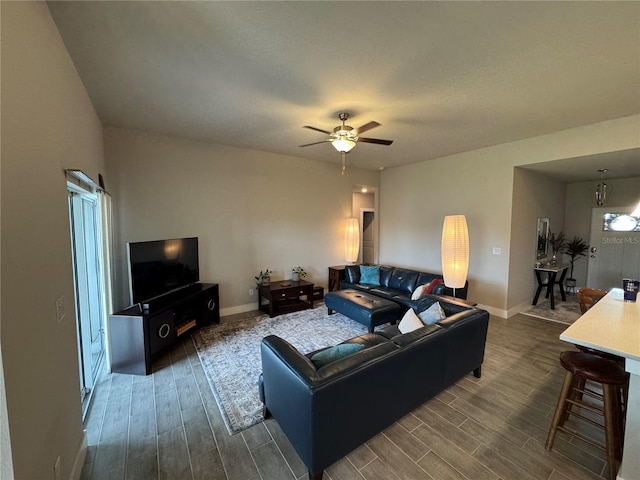 living room featuring ceiling fan