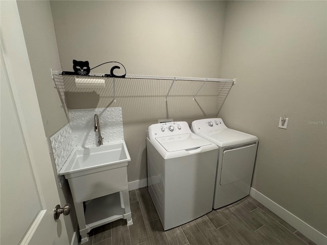 clothes washing area featuring washing machine and dryer