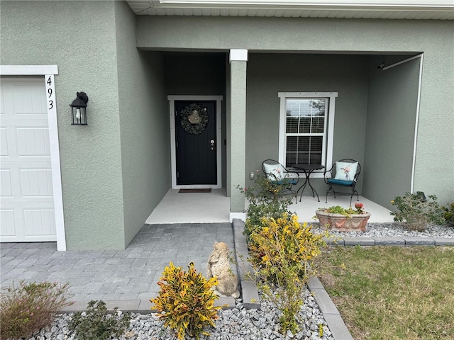 entrance to property with a garage