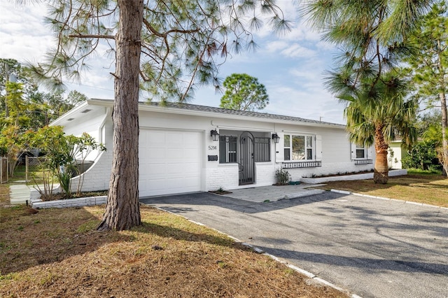 ranch-style house with a garage