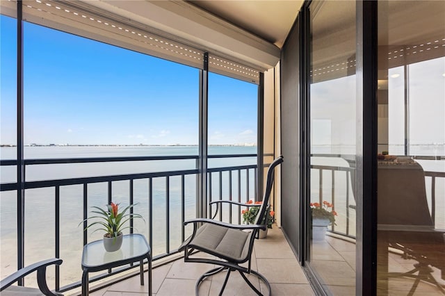 sunroom with a water view