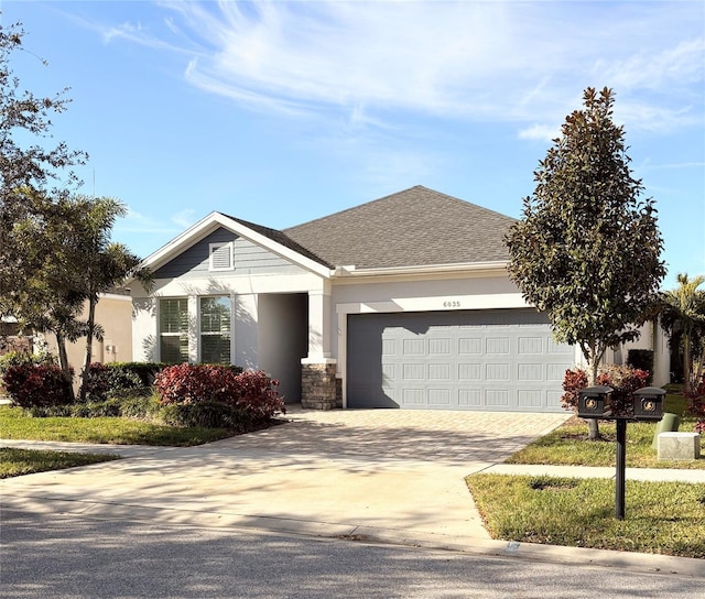 view of front of home with a garage