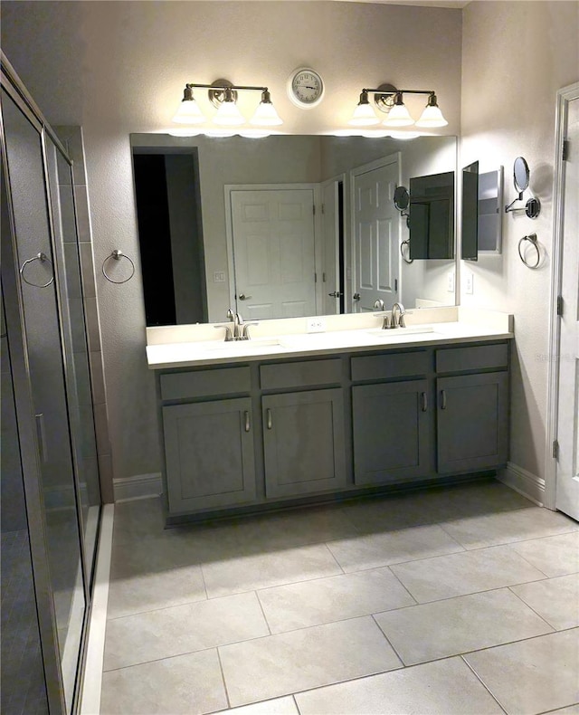 bathroom featuring vanity and tile patterned flooring