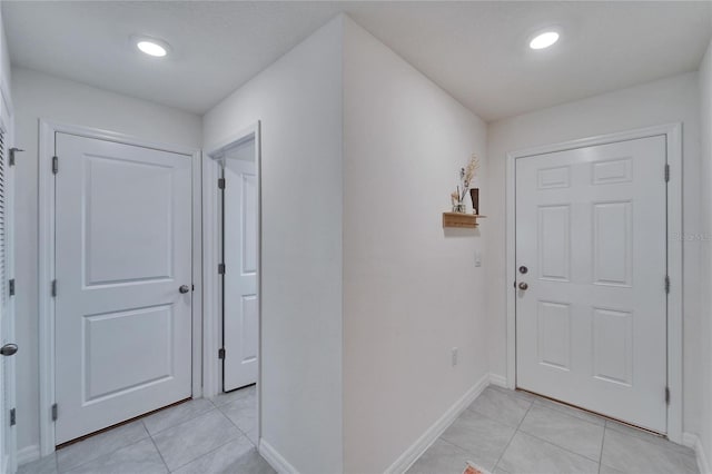 interior space with light tile patterned floors