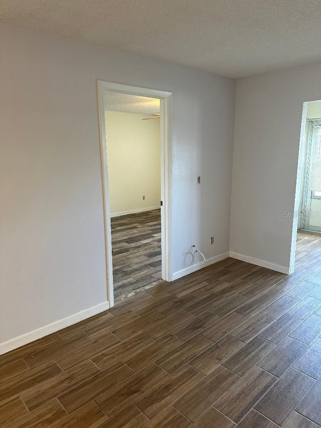 empty room featuring a textured ceiling