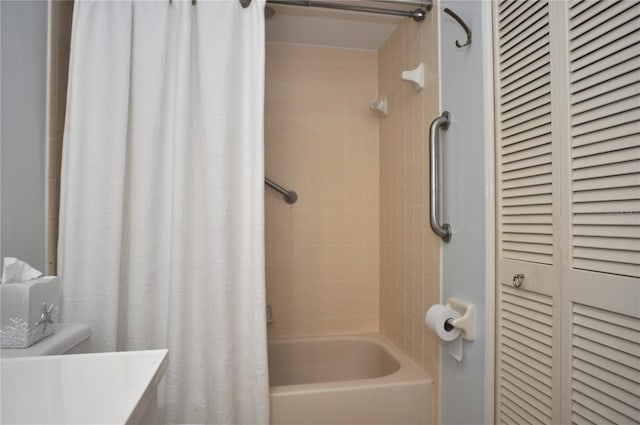 bathroom with shower / tub combo with curtain