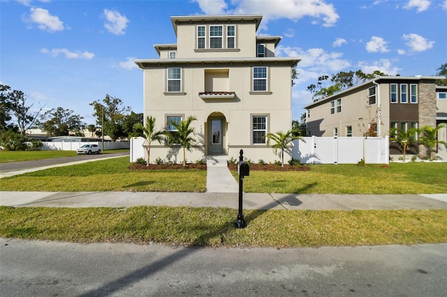 view of front of property featuring a front lawn