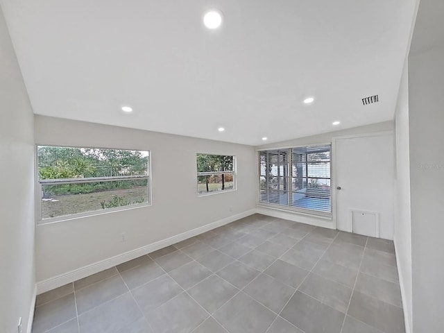 view of tiled spare room