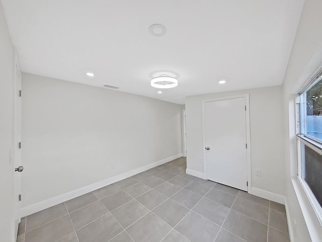 interior space featuring light tile patterned flooring