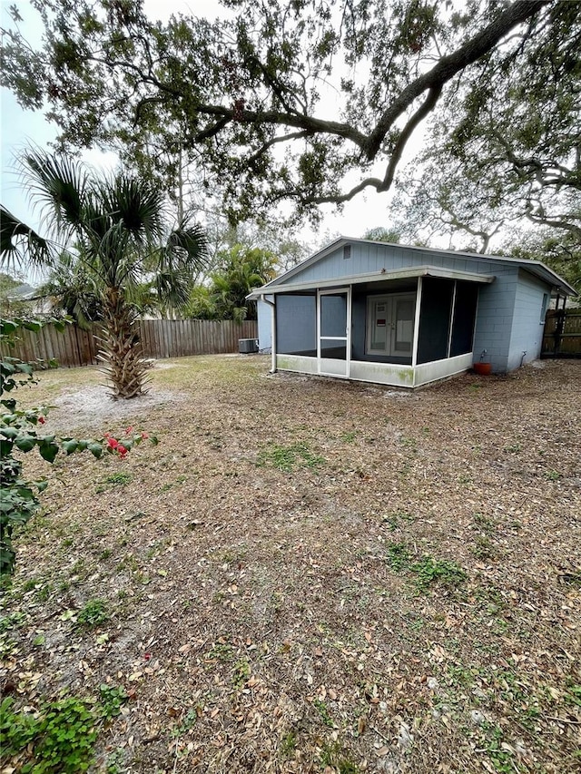 view of yard featuring a sunroom