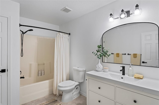 full bathroom featuring vanity, shower / tub combo with curtain, tile patterned floors, and toilet