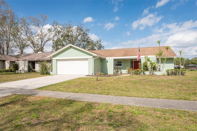 single story home with a garage and a front lawn