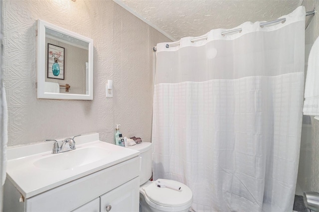 bathroom with vanity, walk in shower, a textured ceiling, and toilet