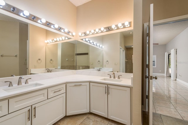 bathroom featuring tile patterned floors and vanity