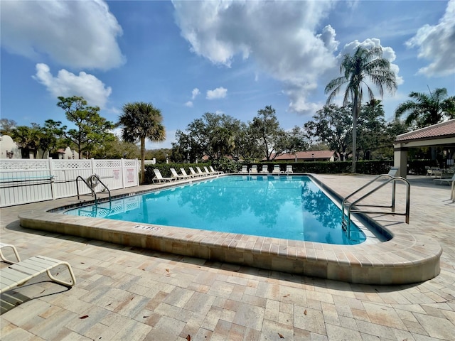 view of pool featuring a patio area