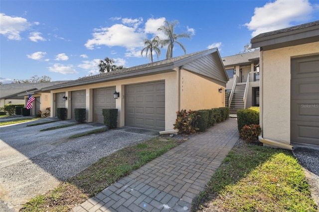 view of property exterior featuring a garage