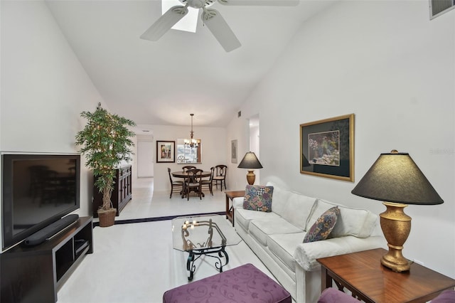 living room with visible vents, ceiling fan with notable chandelier, and vaulted ceiling