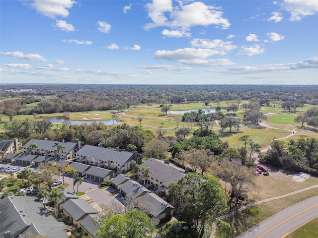 bird's eye view with a residential view, a water view, and view of golf course