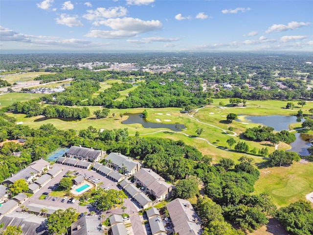 drone / aerial view featuring a water view and view of golf course