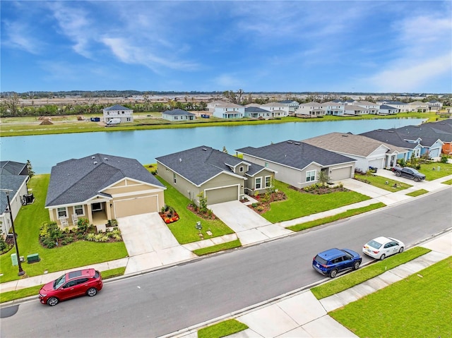 drone / aerial view featuring a water view