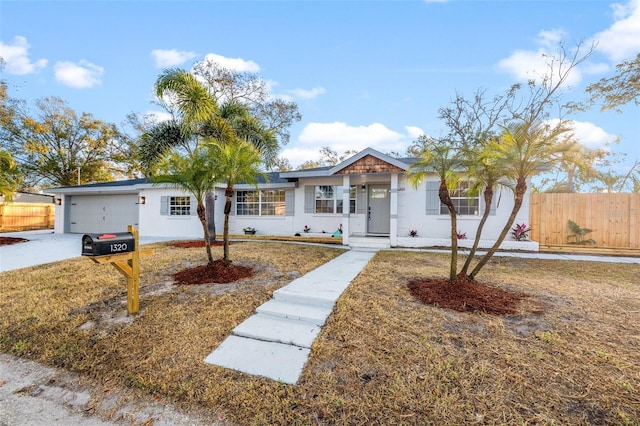 ranch-style home with a garage